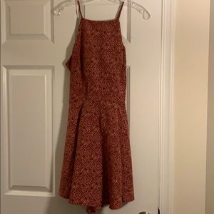 Red and white patterned dress